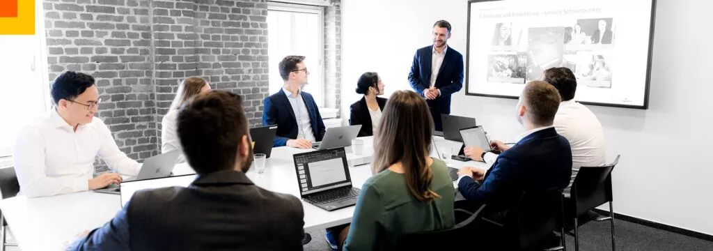 IT consulting team collaborating on a technology project